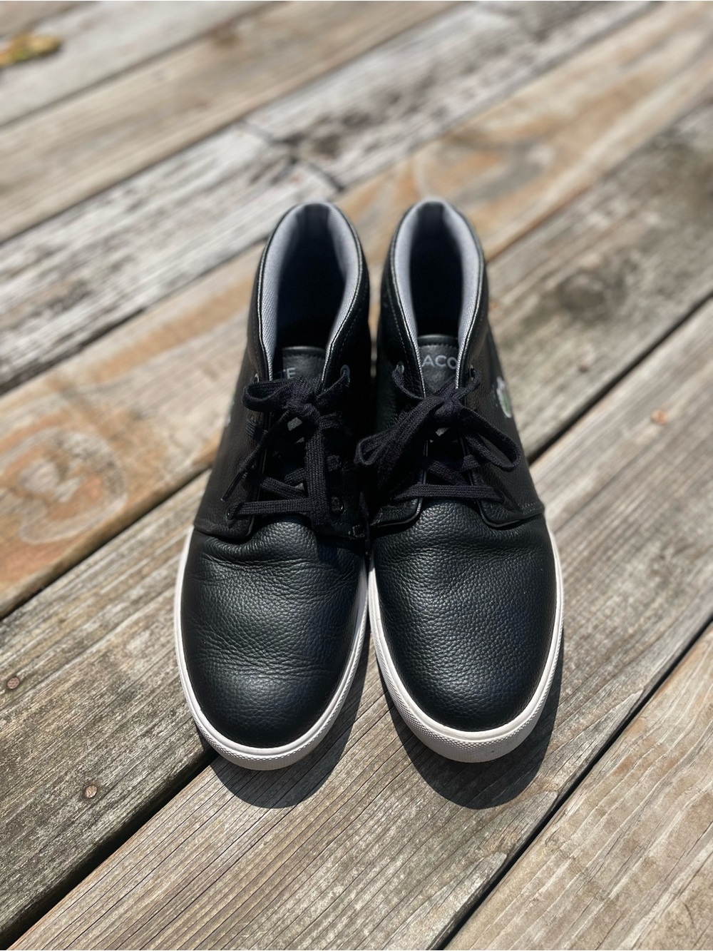 Lacoste Men's Black Leather Slip-On Style Sneakers with White Sole